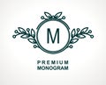 Premium monogram template for your emblems, logos, chevrons, labels. Floral ornament. Fancy wreath. Leaf vector frame.