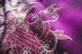 Premium purple fabric with batik pattern Royalty Free Stock Photo