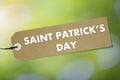 Label with text SAINT PATRICK`S DAY with green background Royalty Free Stock Photo