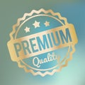 Premium Quality rubber stamp gold on a blue bokeh fog background