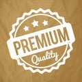 Premium Quality rubber stamp white on a crumpled paper brown background