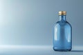 Blue Glass Bottle with Golden Cap Royalty Free Stock Photo