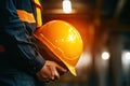Premium Quality Visual of Closeup Engineer Holding Hardhat Engineering Equipment Royalty Free Stock Photo