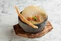 Premium Shark Fin in Supreme Broth accompanied with Crispy Sping Roll served in Japanese Stone Pot served in a dish isolated on