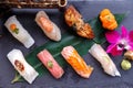 Premium Sushi Set Include Engawa, Hamachi, Hotate, Toro, Foie Gras, Salmon, Sea Urchin and Tai. Royalty Free Stock Photo