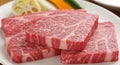 Premium Wagyu Beef Slices on a Plate Ready for Grilling or Cooking Royalty Free Stock Photo