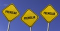 Premolar - three yellow signs with blue sky background