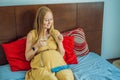 Prenatal Vitamins. Portrait Of Beautiful Smiling Pregnant Woman Holding Pill Box and a glass of water, Taking Royalty Free Stock Photo