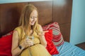 Prenatal Vitamins. Portrait Of Beautiful Smiling Pregnant Woman Holding Pill Box and a glass of water, Taking Royalty Free Stock Photo