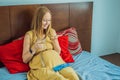 Prenatal Vitamins. Portrait Of Beautiful Smiling Pregnant Woman Holding Pill Box and a glass of water, Taking Royalty Free Stock Photo