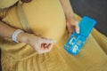 Prenatal Vitamins. Portrait Of Beautiful Smiling Pregnant Woman Holding Pill Box, Taking Supplements For Healthy Royalty Free Stock Photo