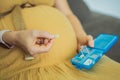 Prenatal Vitamins. Portrait Of Beautiful Smiling Pregnant Woman Holding Pill Box, Taking Supplements For Healthy Royalty Free Stock Photo