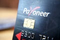 Prepaid payment card Payoneer background, closeup