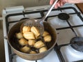 Preparation of Arabic dessert Tulumba in boiling oil. Tulumba- arabian syrup-soaked fried sponge honey