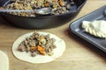 Preparing Argentine Empanadas With Ground Beef Stuffing and Shaping for Oven Baking