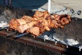 Preparation of barbecue meat shish kebab on skewers grill. Concept of lifestyle street food.