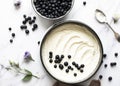 Preparation of blueberry cheesecake aerial view