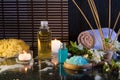 Preparation for the bubble bath and candles and diffuser essences Royalty Free Stock Photo