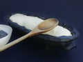 Preparation of buchty , traditional Czech sweet buns made of yeast dough - filling with ground poppy seeds and curd