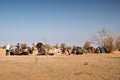 Preparation of a caravan of camels in the Sahara