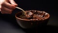 Preparation of chocolate in a bowl. AI generated