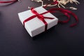 Preparation for Christmas New Year holiday background gift box dark Royalty Free Stock Photo