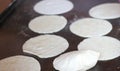 Preparation of corn tortilla in comal