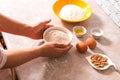 Preparation for dough mix. closeup woman hands preparing ingredients for baking bread or cookies in bright kitchen with marble Royalty Free Stock Photo