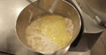 Preparation of dough in a professional electric mixer. Professional dough mixer.