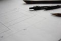 Preparation for drafting documents, drawings, tools and diagrams on the table. Royalty Free Stock Photo