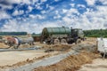 Preparation of drilling mud on a construction site against a background of blue sky. Exploration of useful minerals. Industry and Royalty Free Stock Photo