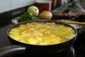 Preparing a delicious Spanish omelette in the kitchen. Royalty Free Stock Photo