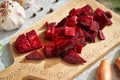 Sliced red beets with garlic, onion and spices - ingredients to prepare beet kvass Royalty Free Stock Photo