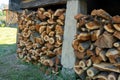 Preparation of firewood for the winter. firewood background, Stacks of firewood