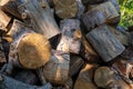 Preparation of firewood for the winter. firewood background, Stacks of firewood