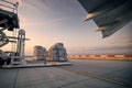 Loading of cargo containers to plane at airport Royalty Free Stock Photo