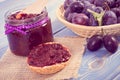 Preparation fresh sandwiches with homemade plum marmalade or jam, sweet breakfast or dessert concept Royalty Free Stock Photo