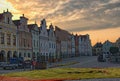 Preparation of a hot air balloon for flight in the main square of the city Telc. The balloon is unfolding for further air filling Royalty Free Stock Photo