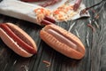 preparation of hot dogs with sausage.photo on a wooden background Royalty Free Stock Photo