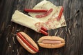 preparation of hot dogs with sausage.photo on a wooden background Royalty Free Stock Photo