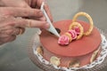 Preparation of a icecream cake with decoration at a icecream shop Royalty Free Stock Photo