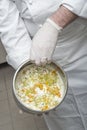 Preparation of icecream cassata tipical of Sicily, Italy, with candied and pistachio