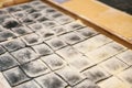 Preparation of Italian dish Ravioli. This is pasta from dough with different fillings. An analog of ravioli is dumplings