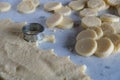 Preparation of italian gnocchi alla romana cutting circles