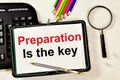 Preparation is the key. Text label in the planning notebook. Royalty Free Stock Photo