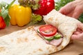 Preparation of lavash roll with meat and vegetables