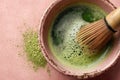 The preparation of matcha tea includes a bamboo whisk in a frothy matcha tea bowl Royalty Free Stock Photo
