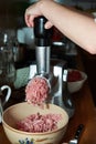 Preparation of minced meat in grinder Royalty Free Stock Photo