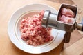 Preparation of minced meat with a manual meat grinder. Royalty Free Stock Photo