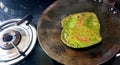 Preparation of Palak Paratha / cheese parantha /roti/chapati Pakistan, North India. Royalty Free Stock Photo